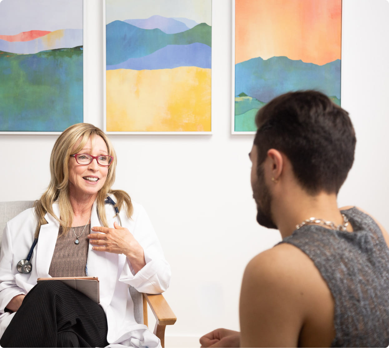 Healthcare worker talking to their client